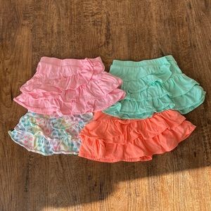 4 size 2T garanimals skirts in great condition